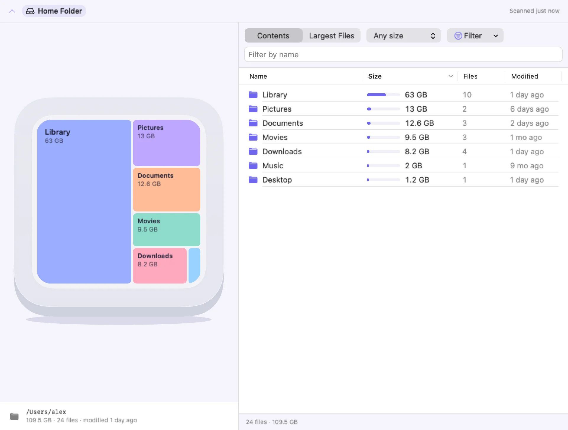 Storage Buddy's Explorer: folders drawn as colored blocks on a Mac mini, with a list of the largest items beside it